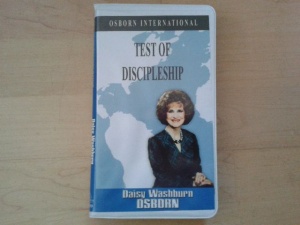 Test of Discipleship written by Daisy Washburn Osborn performed by Daisy Washburn Osborn on Cassette (Abridged)